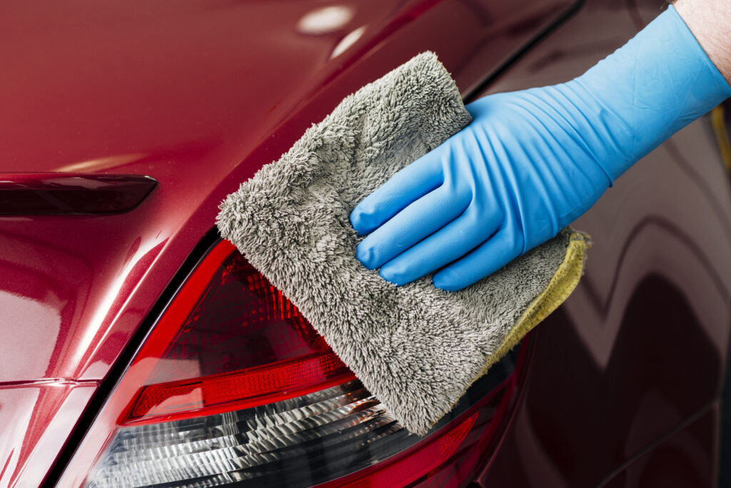 close-up-person-cleaning-car-exterior